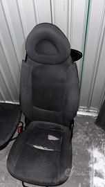 Sedili piu cruscotto piu pannelli porte