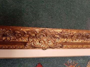 CORNICI  FINITE  A  MANO .