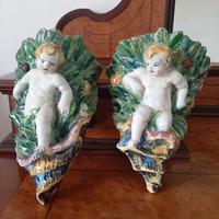 Coppia di antiche fioriere da parete