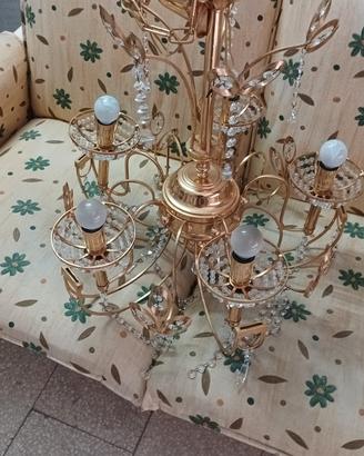 Lampadario in bagno oro 