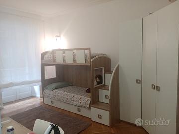 Letto a castello con cassettoni