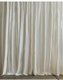 Tende bianche di lino