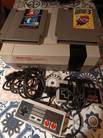 NES Nintendo con pad giochi