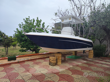 Barca per pesca e famiglia