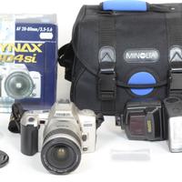 MINOLTA 404Si + 28-80 3,5-5,6 + Flash Sunpak+borsa