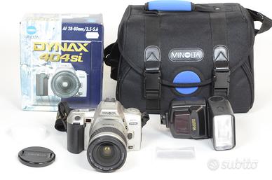 MINOLTA 404Si + 28-80 3,5-5,6 + Flash Sunpak+borsa