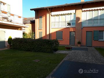 Trilocale con lavanderia, giardino e box doppio