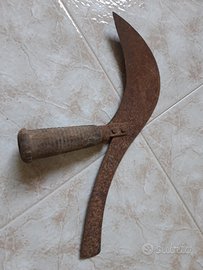 Antico attrezzo da taglio per agricoltura