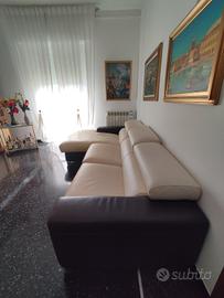 divano con penisola doppio colore in vera pelle