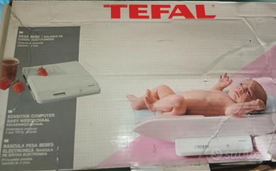 bilancia per neonati e cucina 