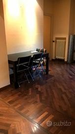 Grande tavolo allungabile nero legno massiccio