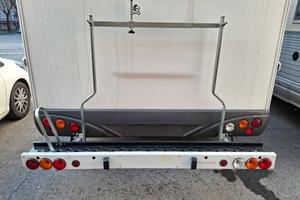 portamoto regolabile