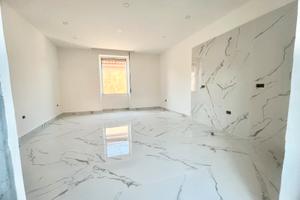 Appart. finemente ristrutturato in corte