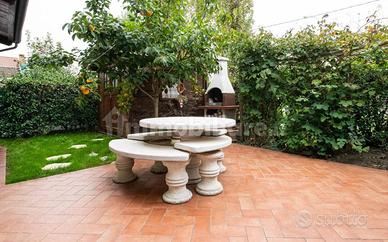 Tavolo da giardino in cemento