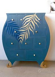 Mobile cassettiera di design. 11 cassetti in legno