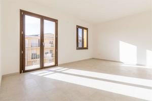 Luminoso quadrilocale con posto auto coperto