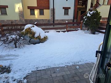 Oulx: Bilocale con Giardino Privato e Box