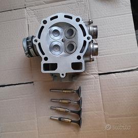 TESTA KTM RACCORDATA CON GUIDE E SEDI VALVOLE NUOV