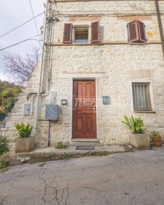 Appartamento con giardino e garage a Sirolo