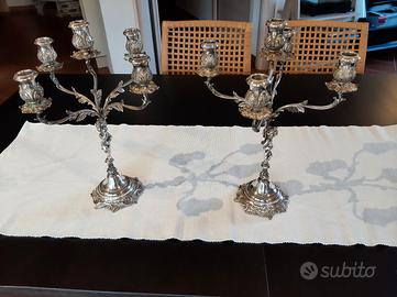 Coppia di candelabri antichi in Argento 800'