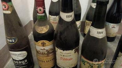 Bottiglie vino varie annate e liquori nuovi