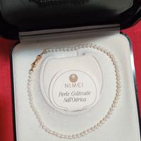 Collana di perle coltivate nell'ostrica Nimei