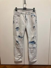 Pantaloni hot sale strappati zara