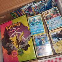 Collezione carte Pokemon album e pack aperti pkm
