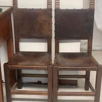 coppia di sedie in cuoio