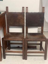coppia di sedie in cuoio