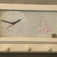 Appendiabiti decorativo con orologio