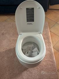 Sanitari nuovi :Vaso + bidet,marca globo filo muro