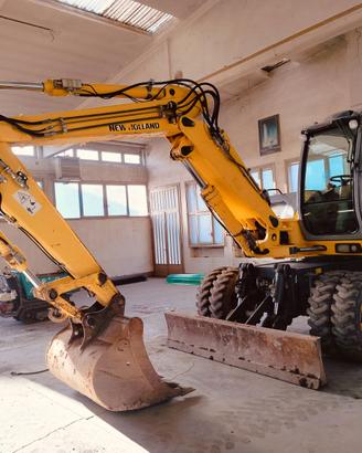 escavatore gommato 125 ql NEW HOLLAND MH 3.6