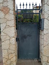 cancello elettrico in ferro battuto