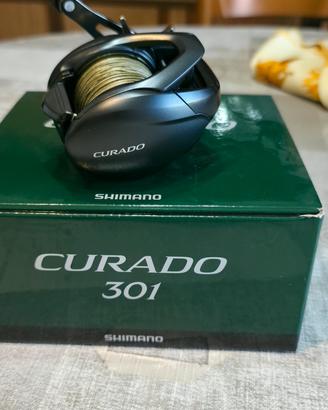 Mulinello Casting Shimano Curado 301 (left hand)