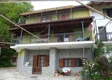 Casa immersa nel verde