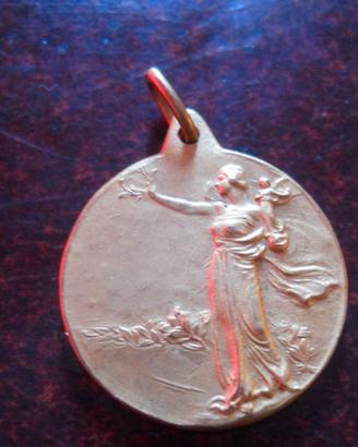 Medaglia in bronzo d'orato riporta la sigla E.O.A.