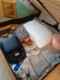 Letto contenitore con testiera in tessuto