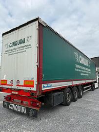 Semirimorchio centinato con buca coils