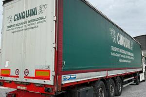 Semirimorchio centinato con buca coils