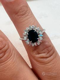 Anello rosetta oro bianco 750 zaffiro e diamanti