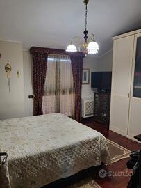Armadio e letto con cassone