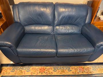 Tris di divani in pelle