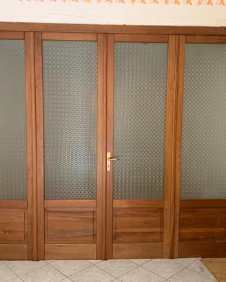 Porta interna in legno  a 4 ante con vetro