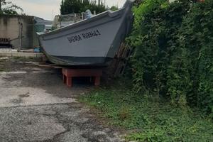 Barca auto svuotante