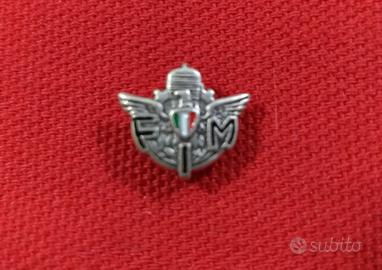 Pin FIM acciaio scritta nera Logo FMI vintage