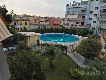 Sabaudia centro quadrilocale con piscina