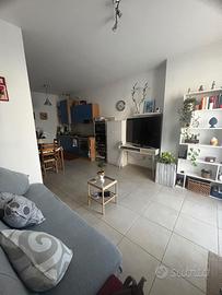 Delizioso bilocale con  giardino e posto auto