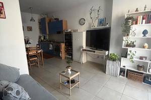 Delizioso bilocale con  giardino e posto auto