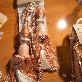 Bracciale per drappeggio tende